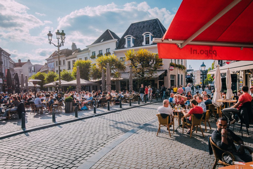 Havermarkt, Breda. Cafe street with people enjoying a drink on a warm summer day.